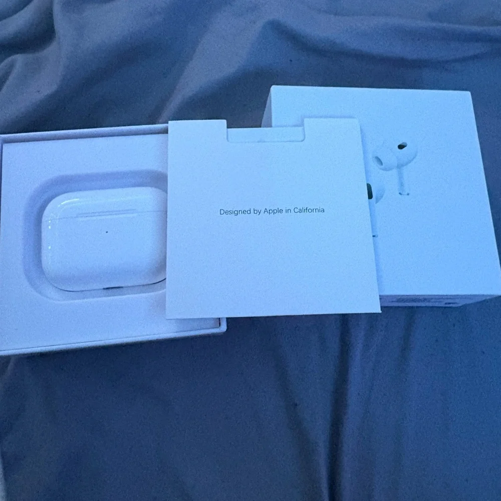 Apple AirPods Pro with White Charging Accessories
